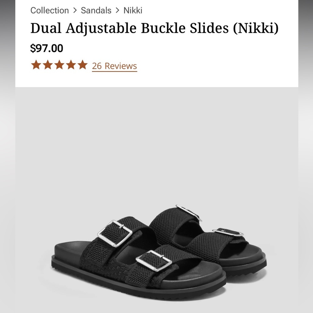 Black buckled slides